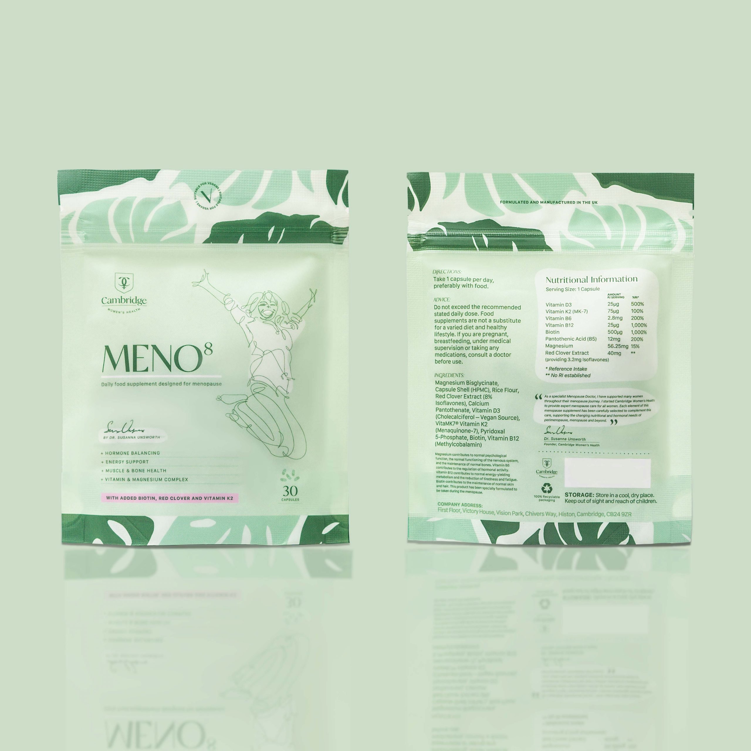 A picture of the front and back of the Meno8 supplement packet on a light green surface.